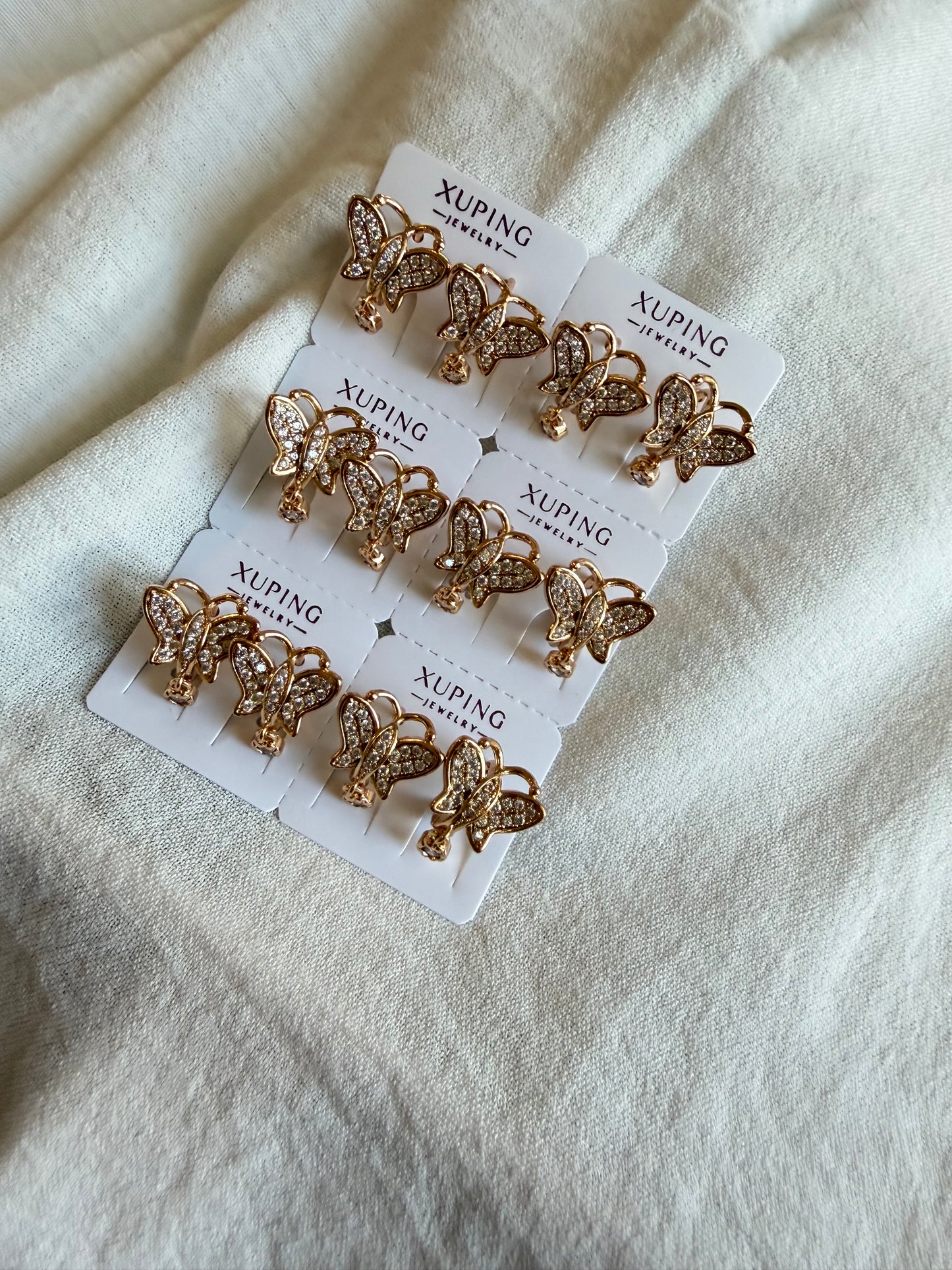 Hoop de mariposa en 18k